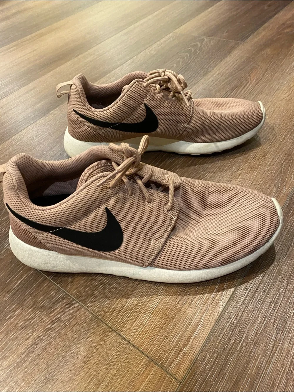 Nike Women's Pink Mesh Athletic Sneakers with Black Swoosh
